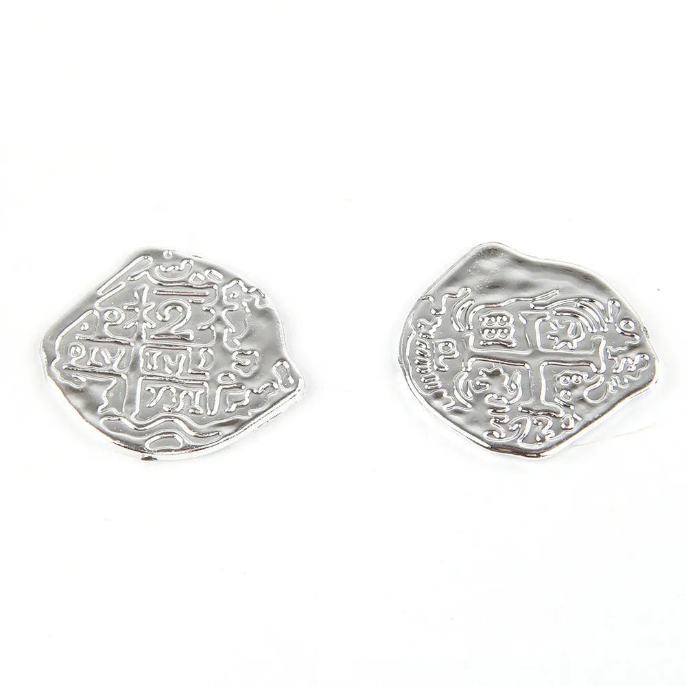Set of 100 Doli Roman pirate coins with electroplated bronze, gold, and silver finishes for decoration.