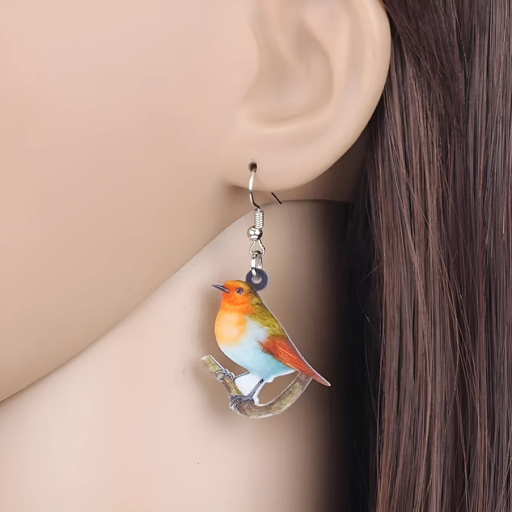 Blue titmouse geometric snake design acrylic pendant earrings in colour option A and B.