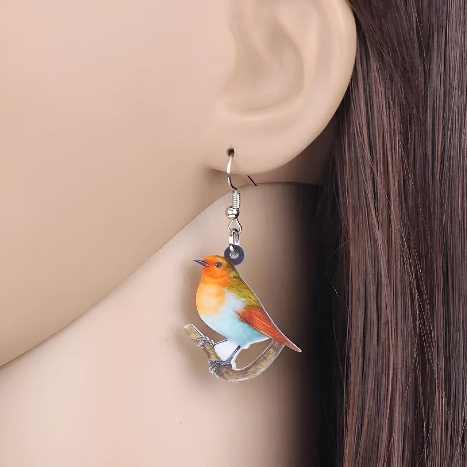 Blue titmouse geometric snake design acrylic pendant earrings in colour option A and B.