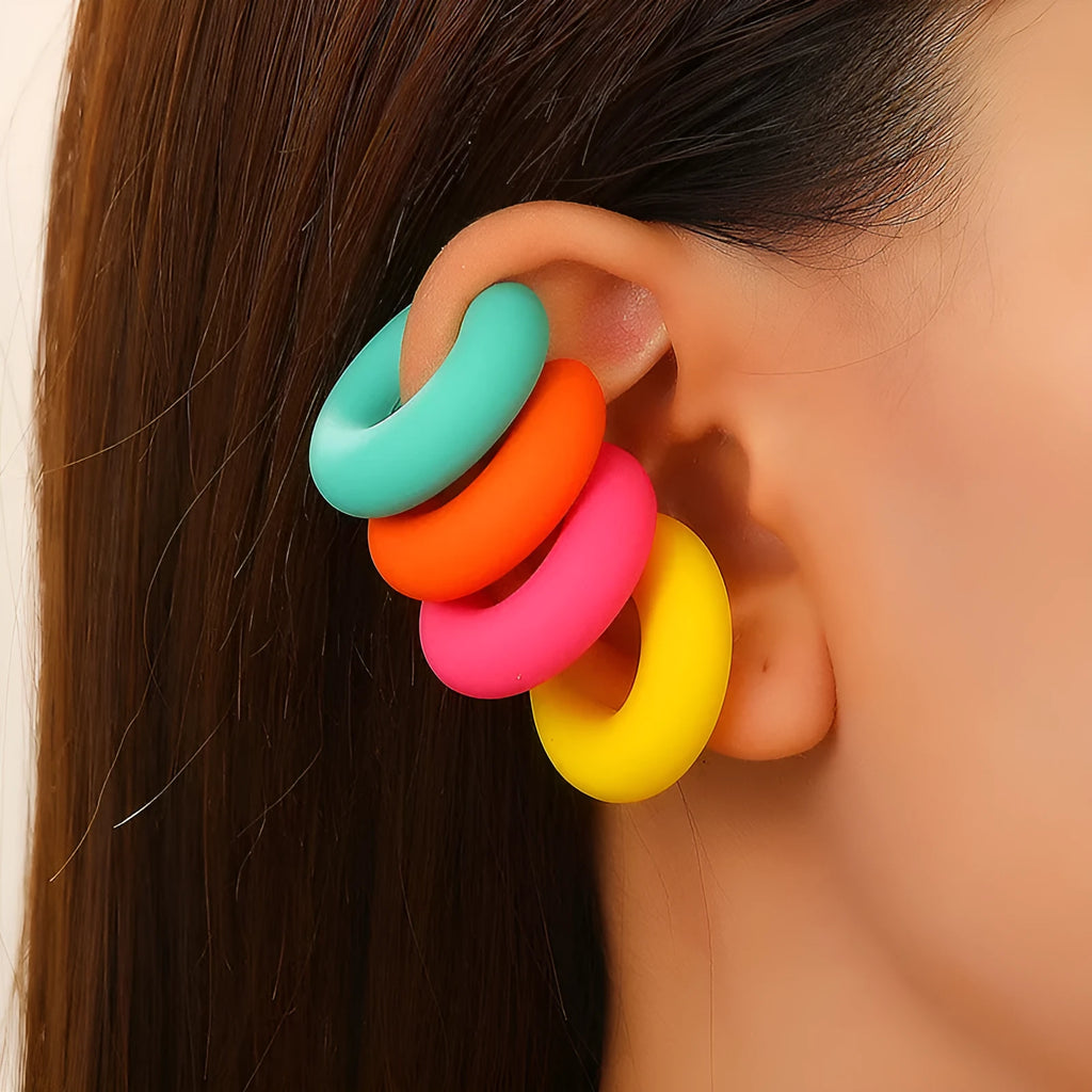 Matte finish geometric C-shaped clip-on earrings in candy colours for women without pierced ears