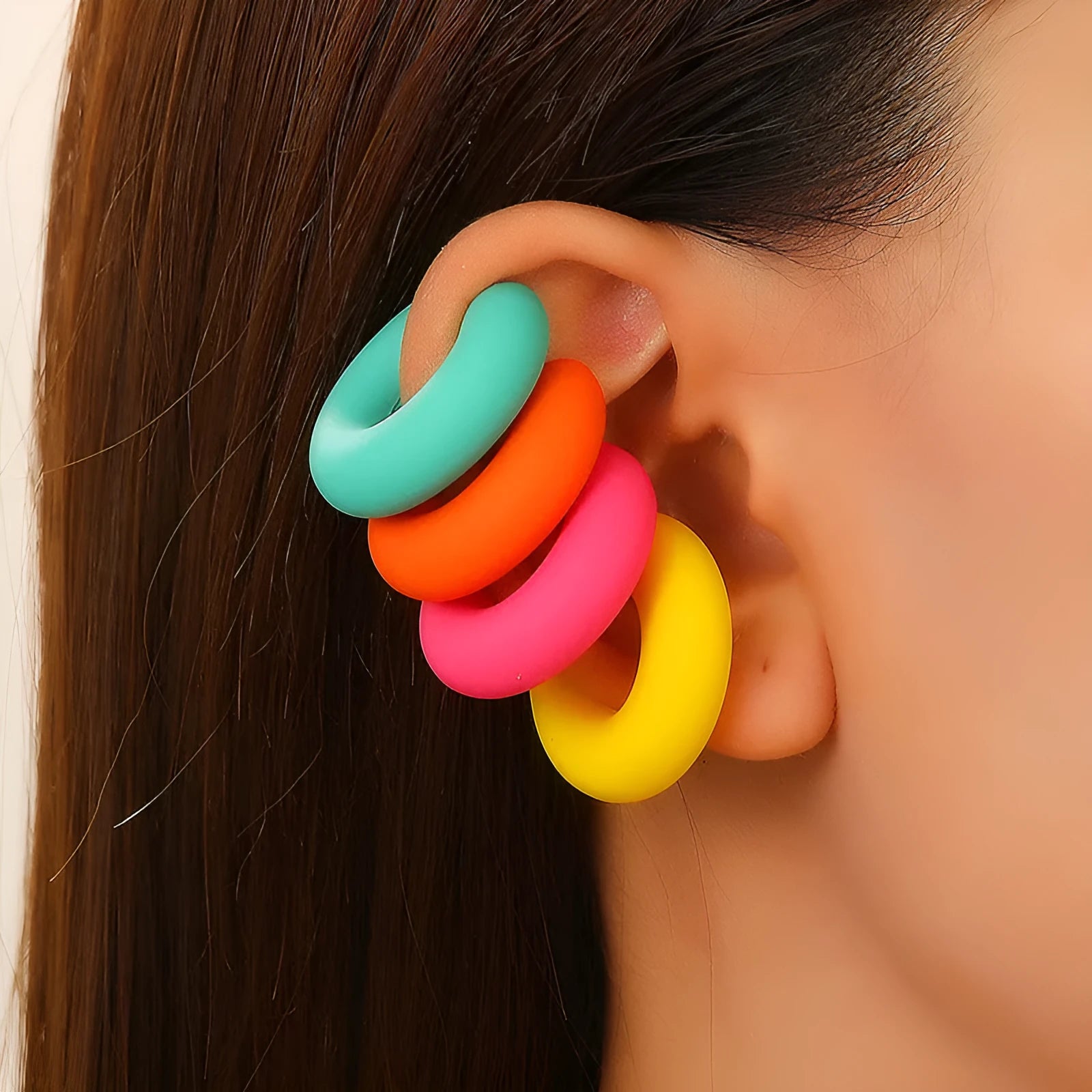 Matte finish geometric C-shaped clip-on earrings in candy colours for women without pierced ears