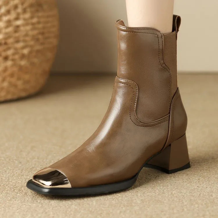 Brown cowhide leather Martin boots with a side zipper and low tube shaft.