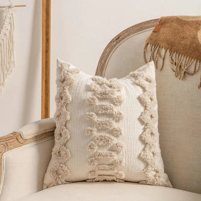 Knitted striped cushion cover with tassel decoration in a choice of six patterns.
