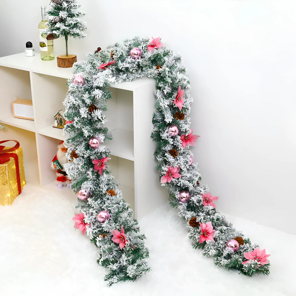 Christmas rattan garland with white flocking in a choice of five colours: golden, blue, silver, pink, and red.