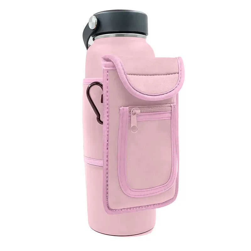Fitness magnetic cup sleeve in grey with carabiner buckle, holding a large black sports water bottle.