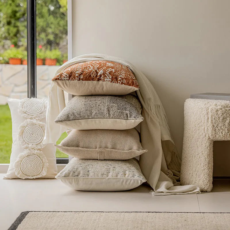 Solid colour square cushion cover with edge pressing detail, shown in Red Brown.