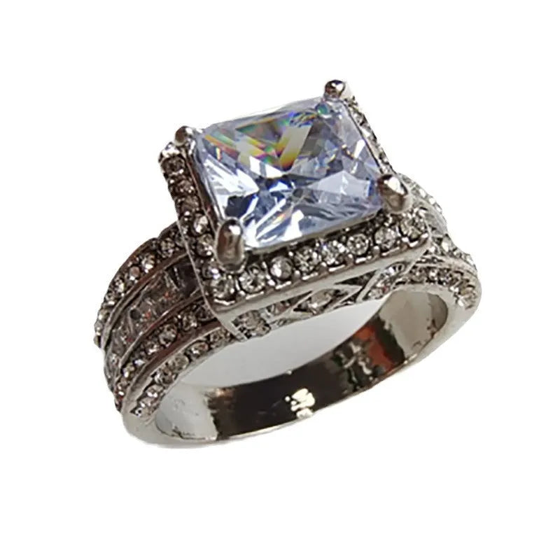 Geometric round women's alloy ring in gold and white colour options on a ring size chart.