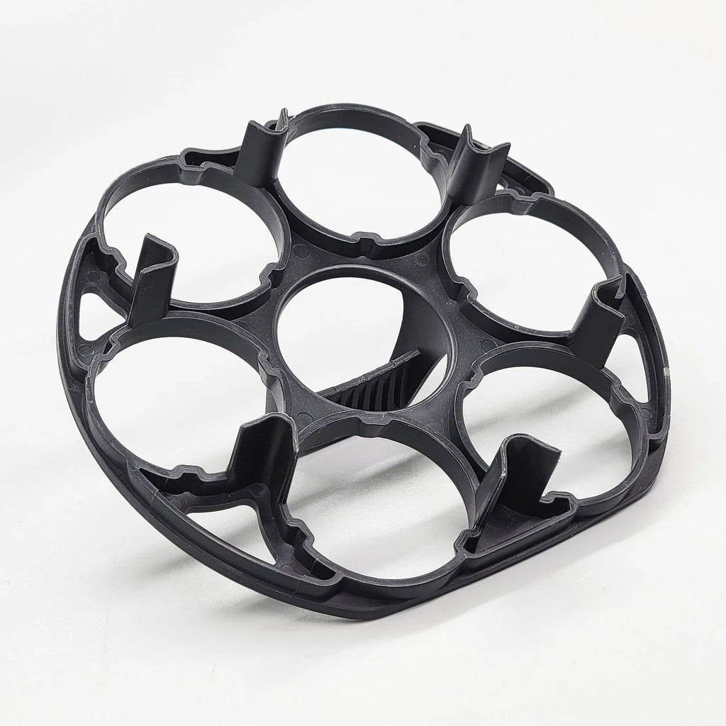 Black plastic egg holder cooking basket rack with modern design on a white background.