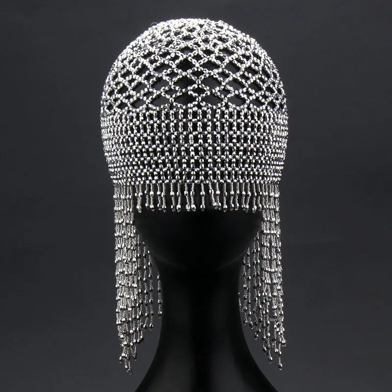 Belly dance headwear with alloy base, handmade beading, and 16.5cm tassels in silver or black mesh decoration