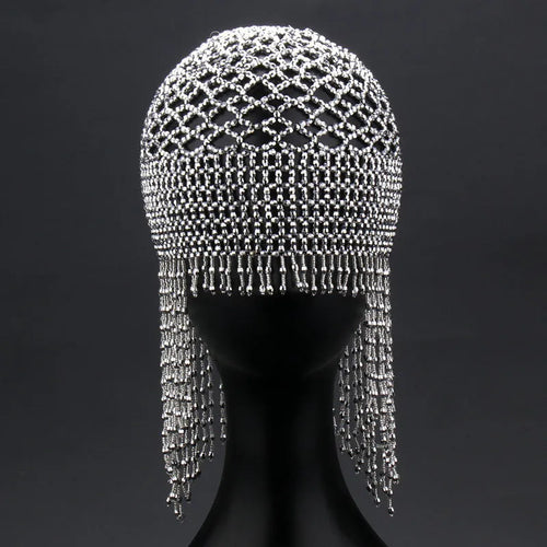 Belly dance headwear with alloy base, handmade beading, and 16.5cm tassels in silver or black mesh decoration