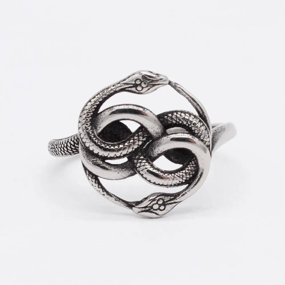 Close-up of a retro-style double snake ring made from titanium steel in a steel colour finish.