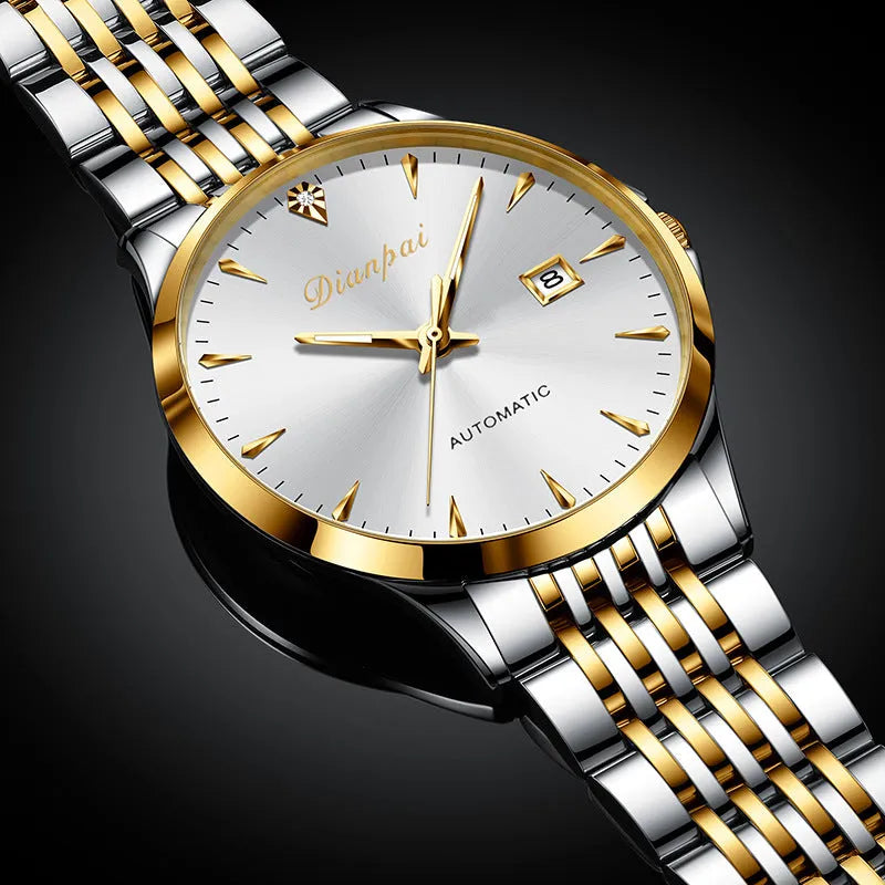 Men's stainless steel automatic mechanical watch with simple dial on wrist.