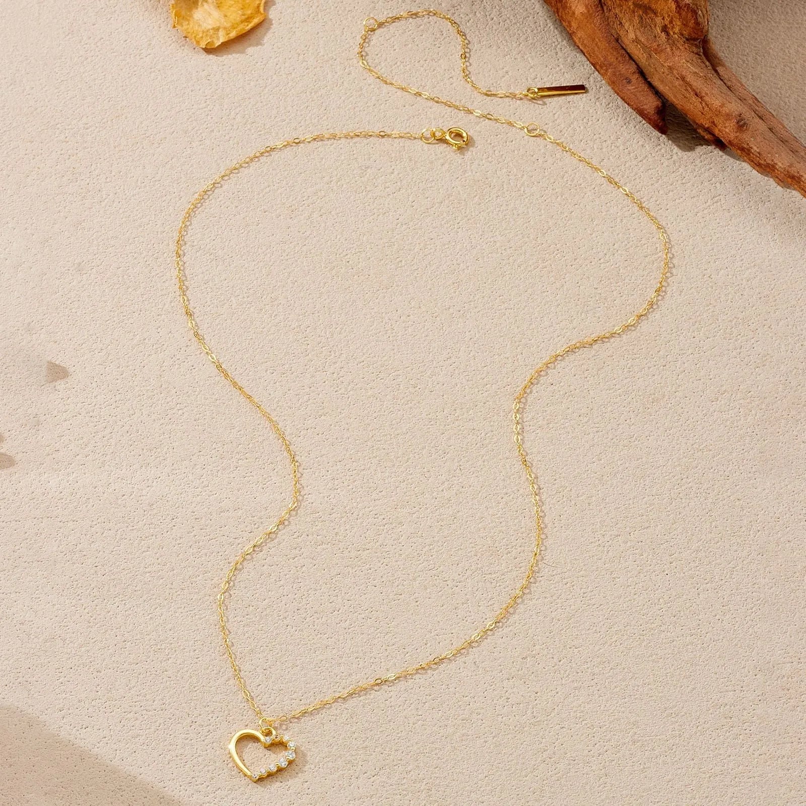 S925 sterling silver hollow heart necklace for women with choice of gold or platinum plating