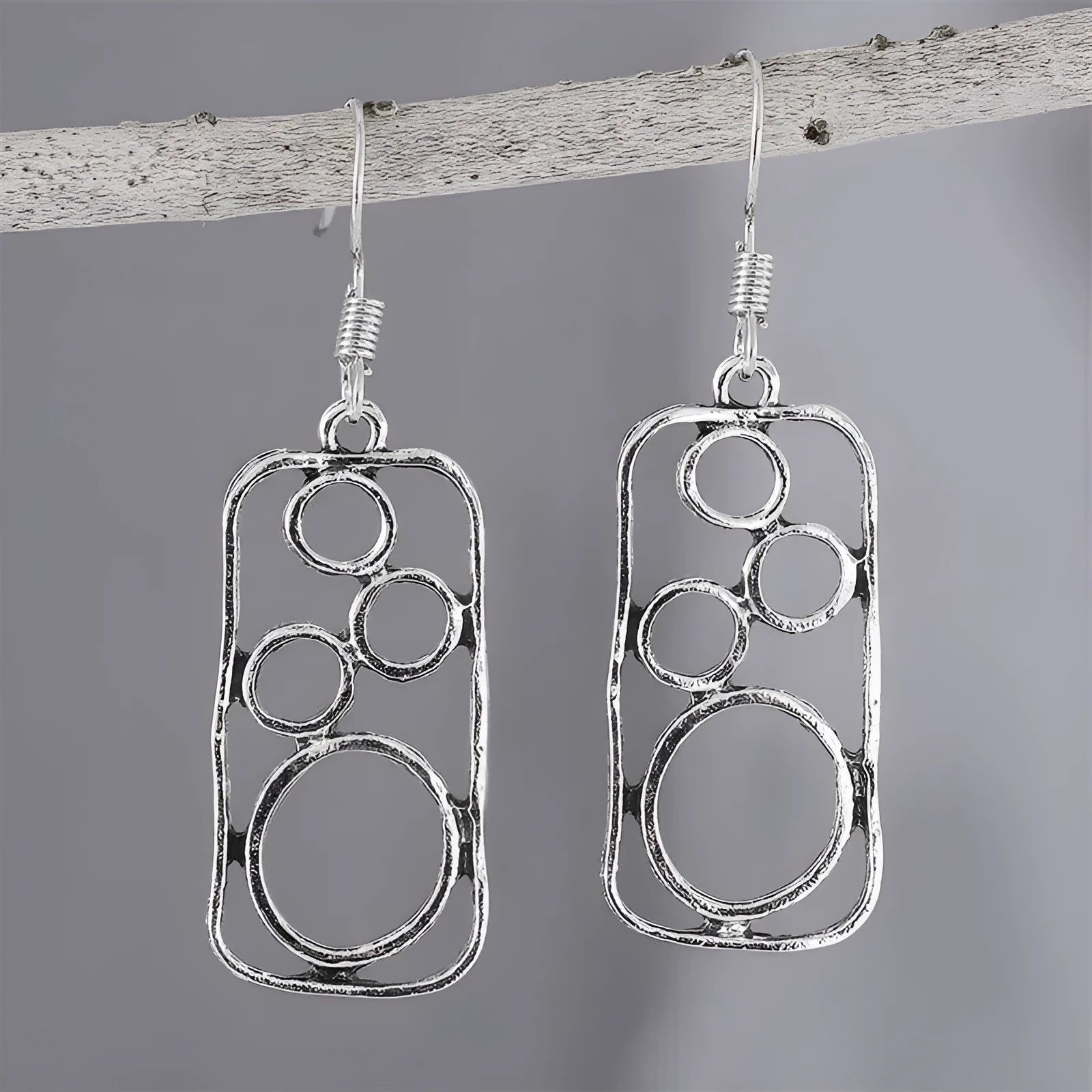 Geometric alloy earrings with round ring design and irregular square shape in antique silver colour