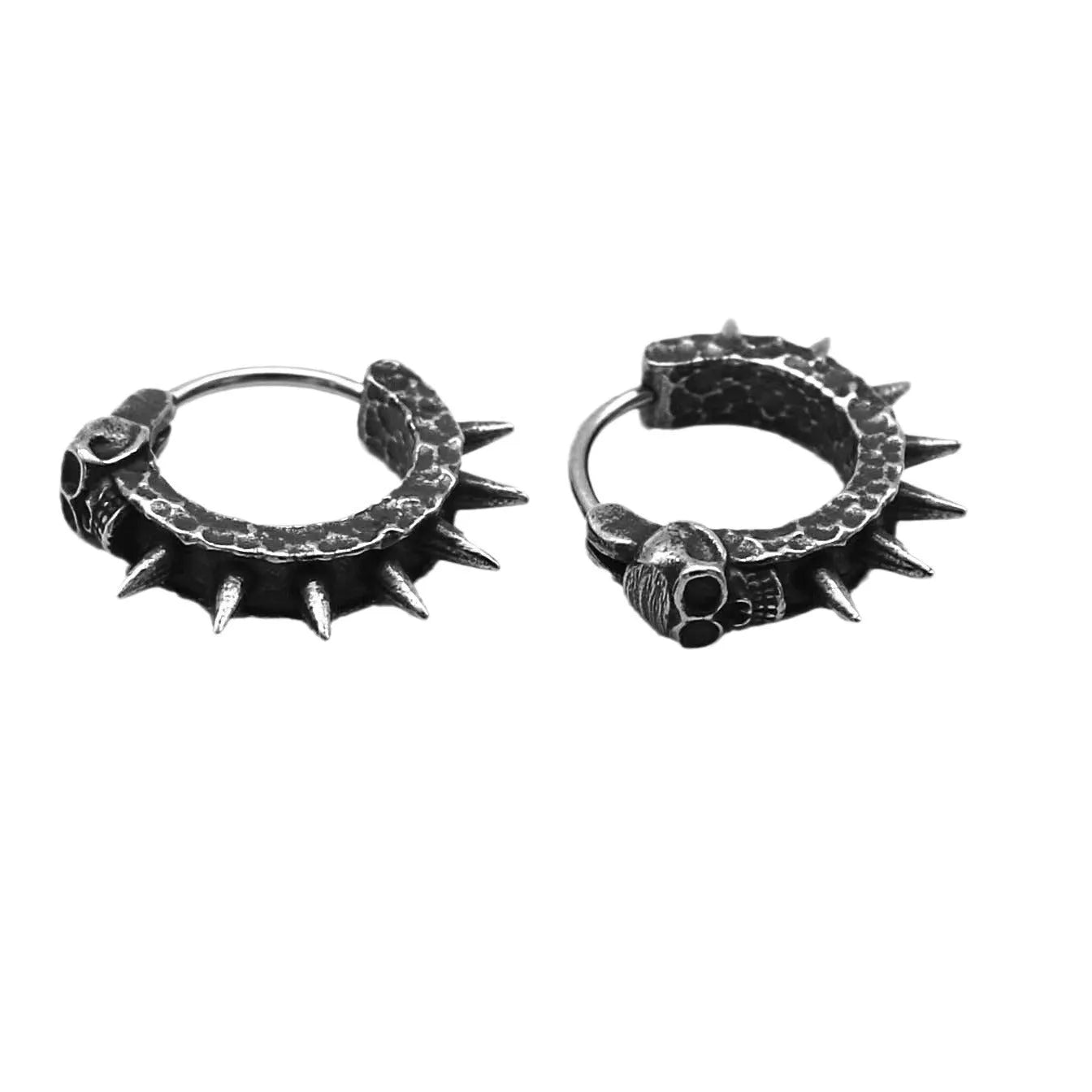 A pair of black alloy earrings with a geometric motorcycle punk design on a white background.
