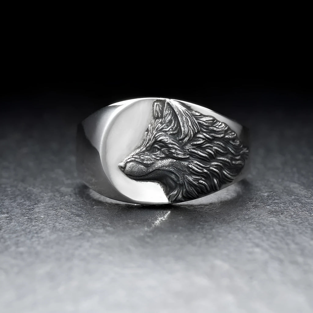Men's silver geometric wolf ring with retro domineering shape on a hand.