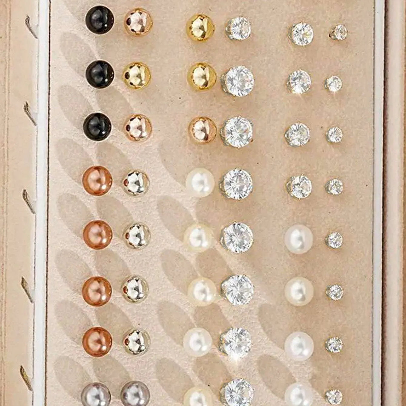 108 geometric pearl earrings with gold electroplated alloy construction and round elements