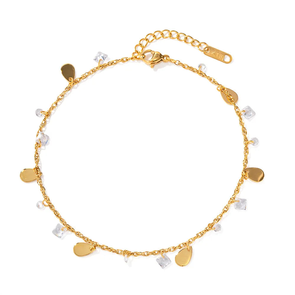 Women's stainless steel geometric anklet with water drop pendant and tassel detailing
