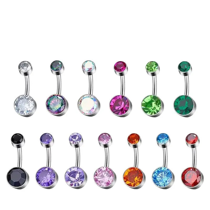 Double-headed zircon titanium alloy navel stud body jewellery on a white background.