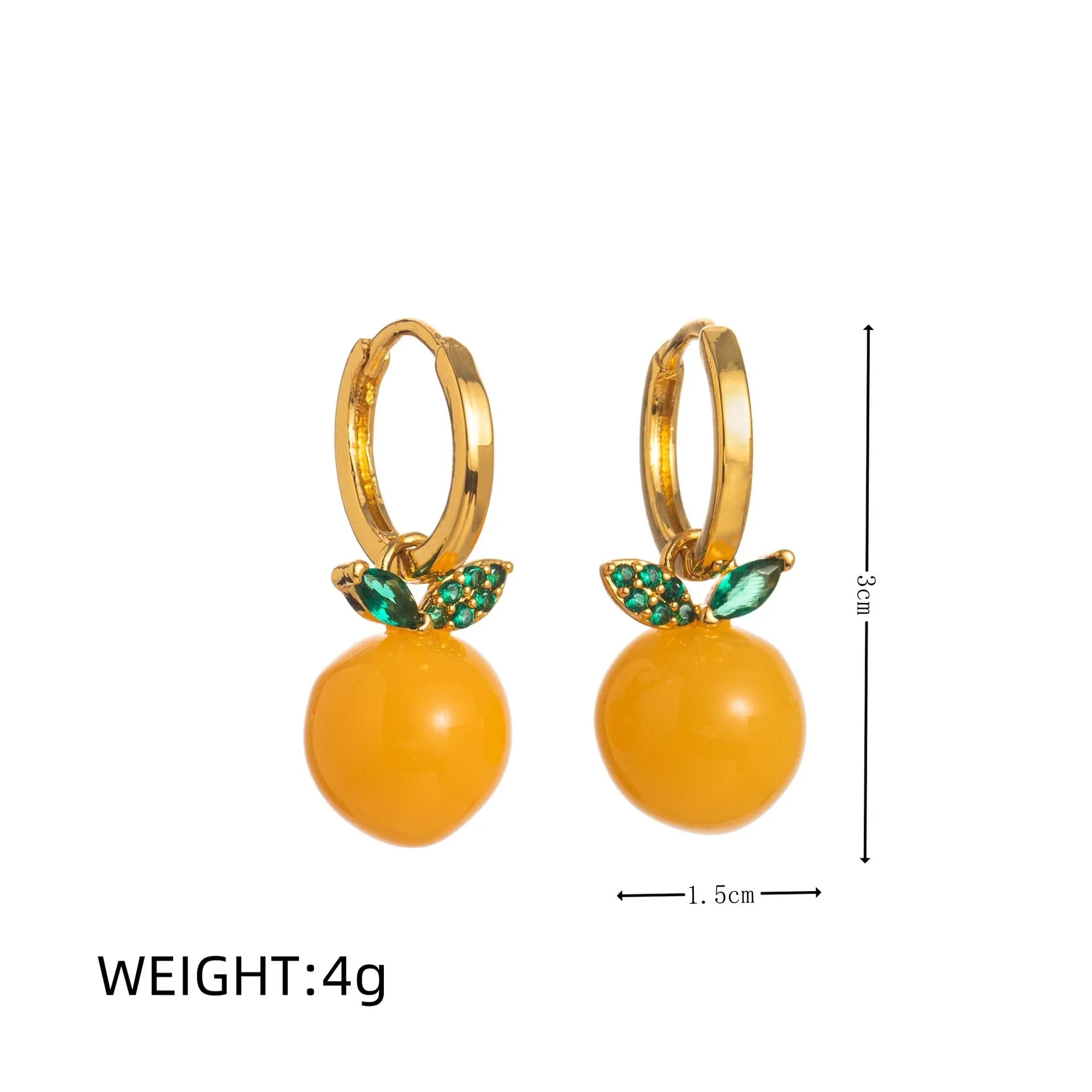 Gold plated copper earrings with colourful fruit and vegetable designs including carrot, lemon, and blueberry styles.