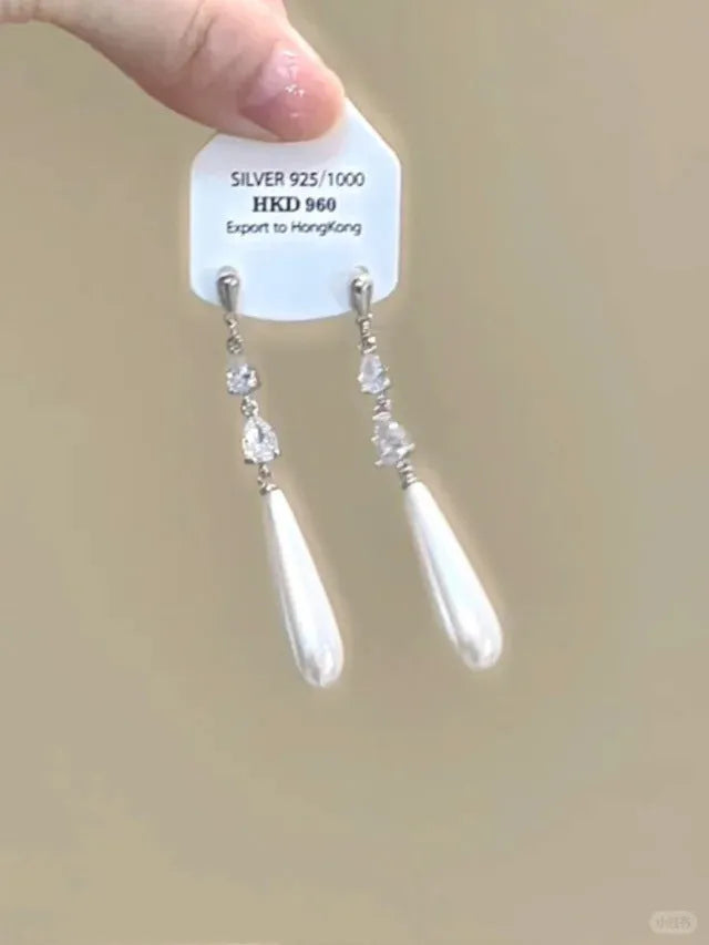 Geometric heart-shaped women's earrings with rhinestone accents and tassel details in electroplated alloy