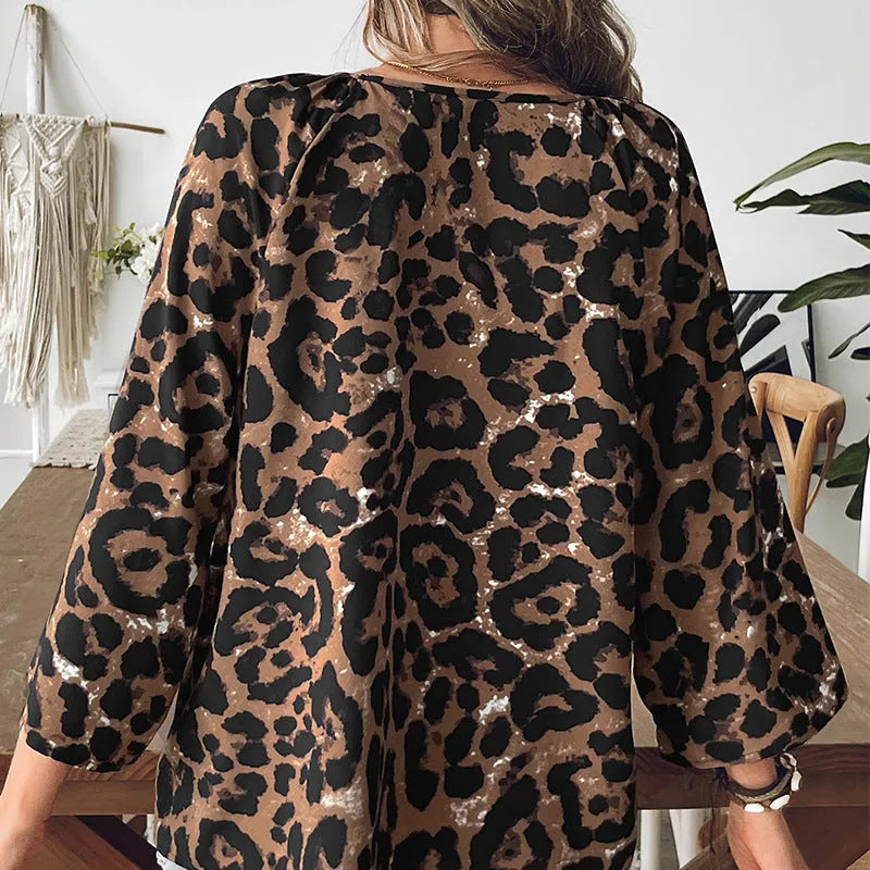 Women's multicolour leopard print half sleeve V-neck pullover top with pleating detail