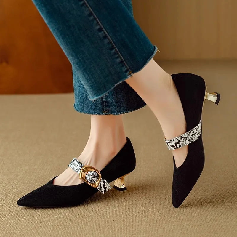 Black and brown women's pointed toe stiletto heels with a buckle fastener and mid-height heel.