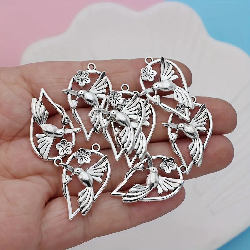 Alloy magpie bird pendant with electroplated finish in colour P234 for DIY jewellery making