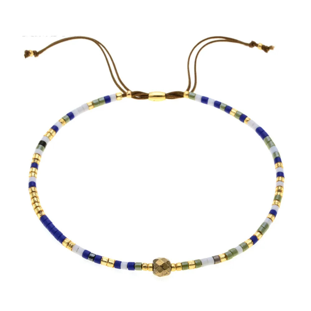 Women's handmade bohemian bracelet with semi-precious stone bead and colourful glass beads.
