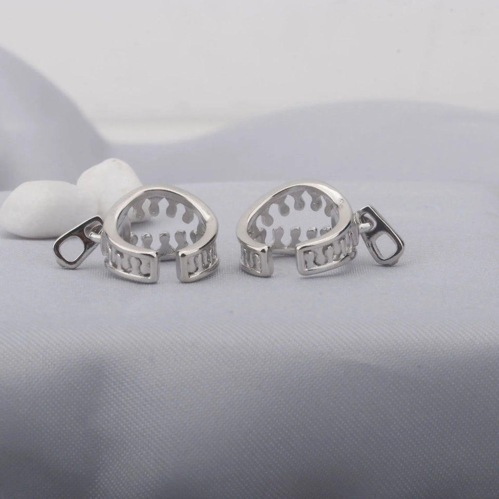Copper geometric ear clips with line detailing and bone clip fastening in ES862 colour