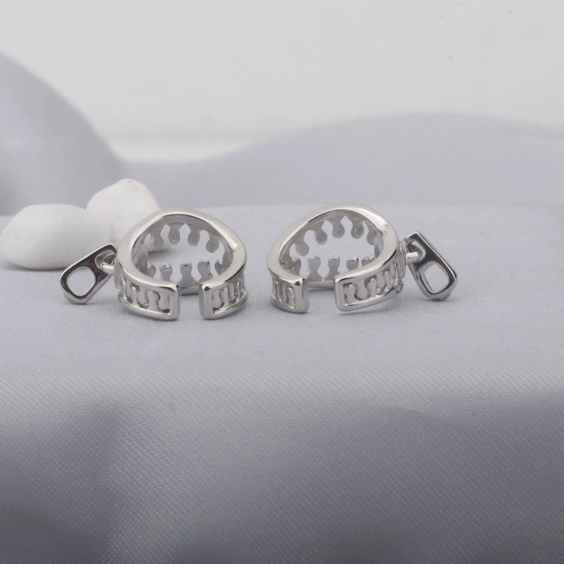 Copper geometric ear clips with line detailing and bone clip fastening in ES862 colour