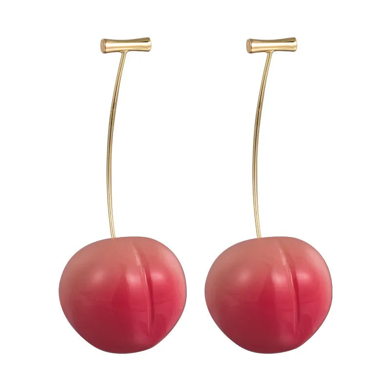 Acrylic peach-shaped dangle earrings with copper findings, shown in small and large size variations.