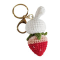 Hand-woven white rabbit strawberry pendant with keychain in cartoon style