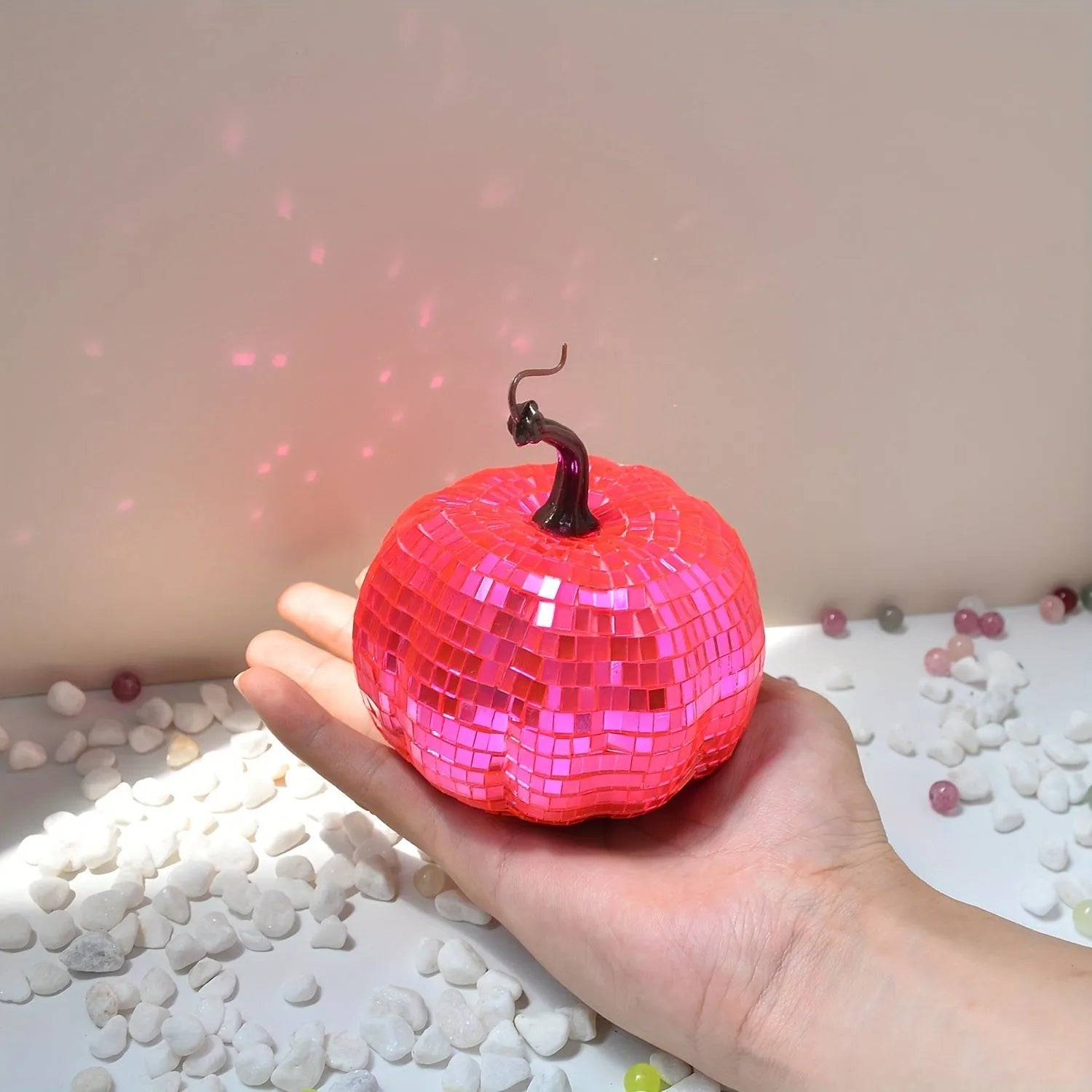 Glass pumpkin Halloween decoration in Chinese style, showing textured embroidered surface