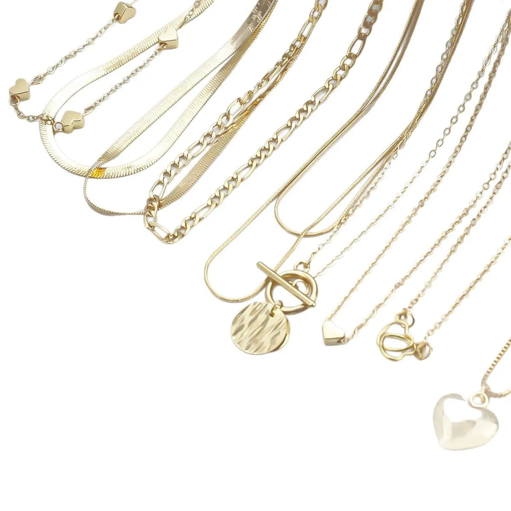 Gold electroplated women's necklace set with 10 pieces featuring snake bone chains and alloy pendants