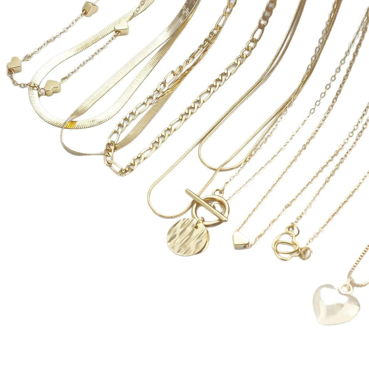 Gold electroplated women's necklace set with 10 pieces featuring snake bone chains and alloy pendants