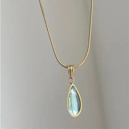 Water drop necklace with mixed gem pendant on titanium snake chain in blue or green.