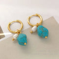Turquoise and cultured pearl ear clip earrings in irregular geometric shape, shown in both short and long dangle styles