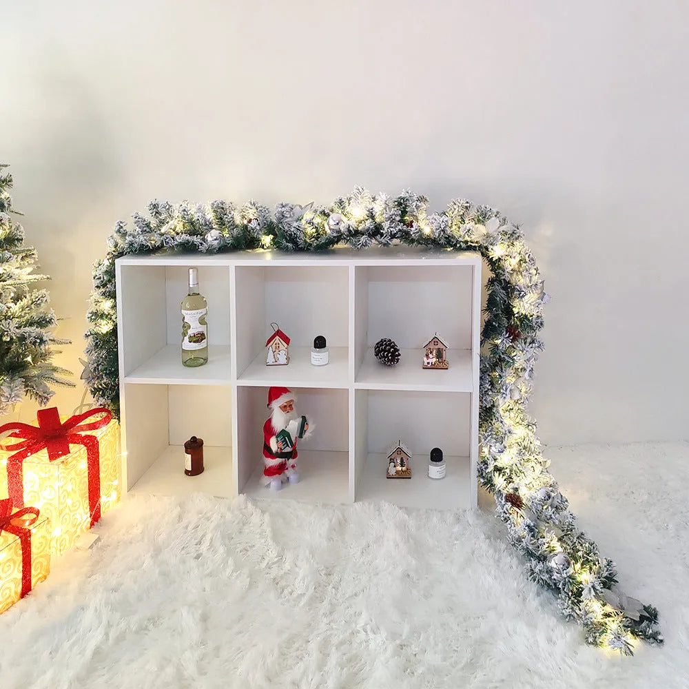 Christmas rattan garland with white flocking in a choice of five colours: golden, blue, silver, pink, and red.