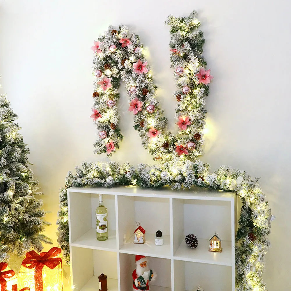 Christmas rattan garland with white flocking in a choice of five colours: golden, blue, silver, pink, and red.