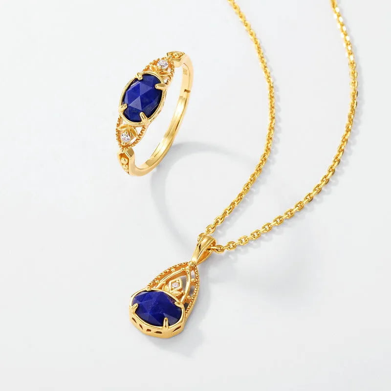 Geometric ellipse lapis lazuli silver ring with Japanese style design on a model's hand.
