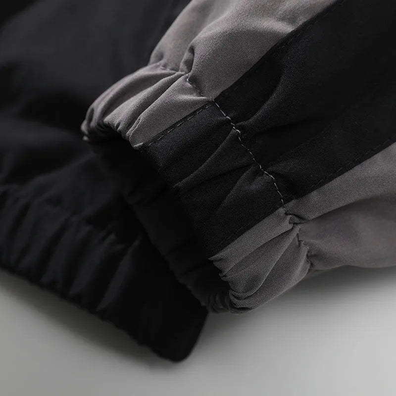 Men's black casual polyester jacket with contrast stitching and side seam pockets