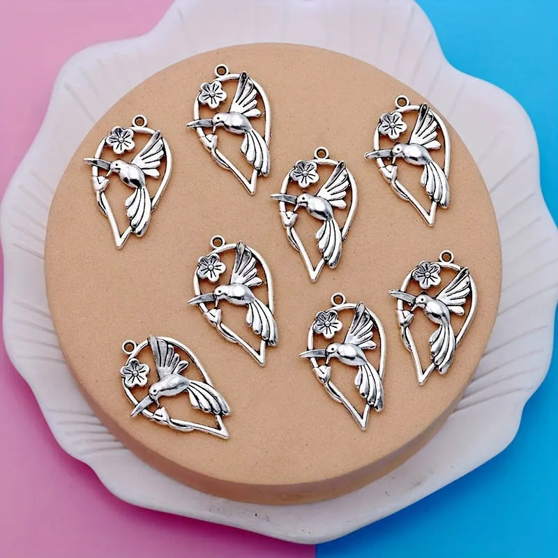 Alloy magpie bird pendant with electroplated finish in colour P234 for DIY jewellery making