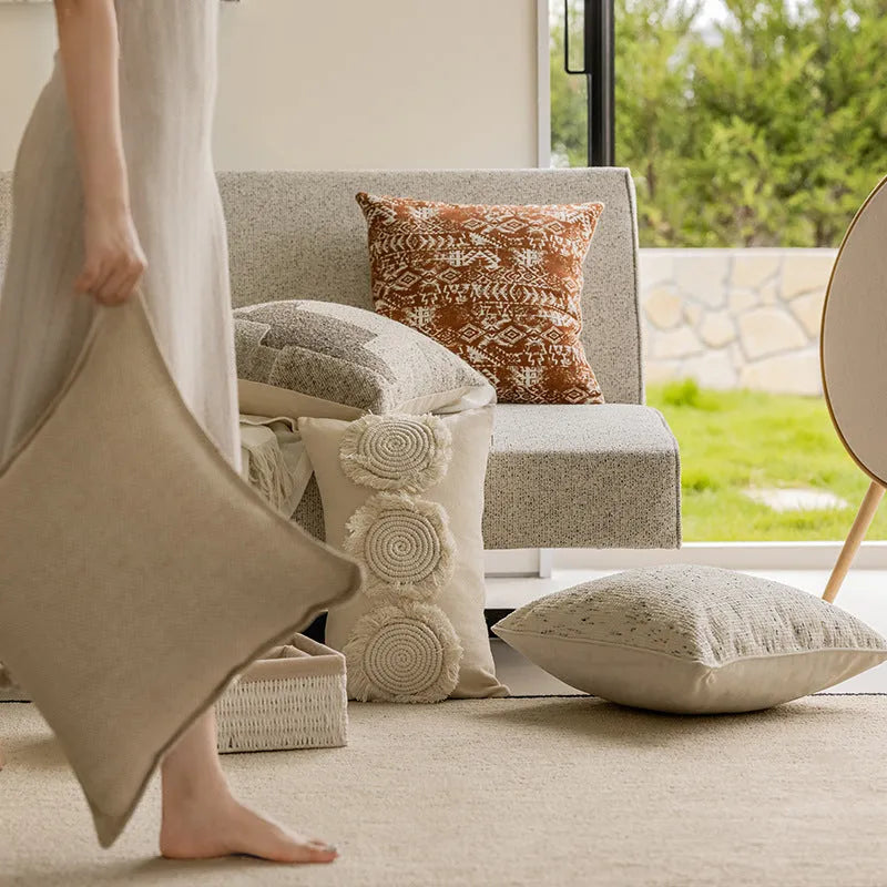 Solid colour square cushion cover with edge pressing detail, shown in Red Brown.