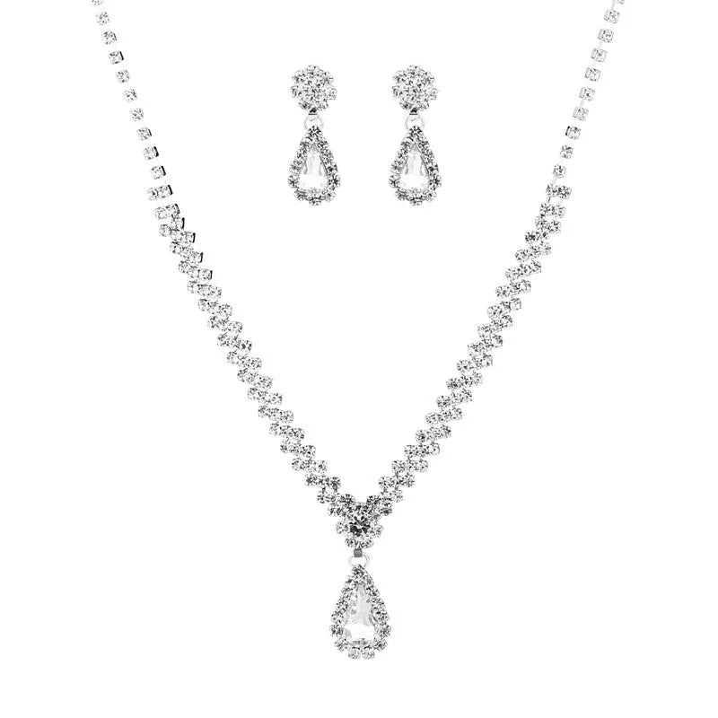Claw chain rhinestone jewellery set with drop-shaped stones in multiple colour options