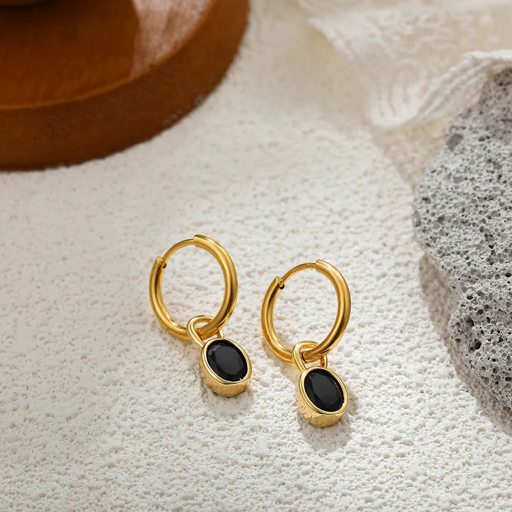 Women's oval zircon earrings in retro copper setting, showing colour options: white, emerald, green, black, red, blue.