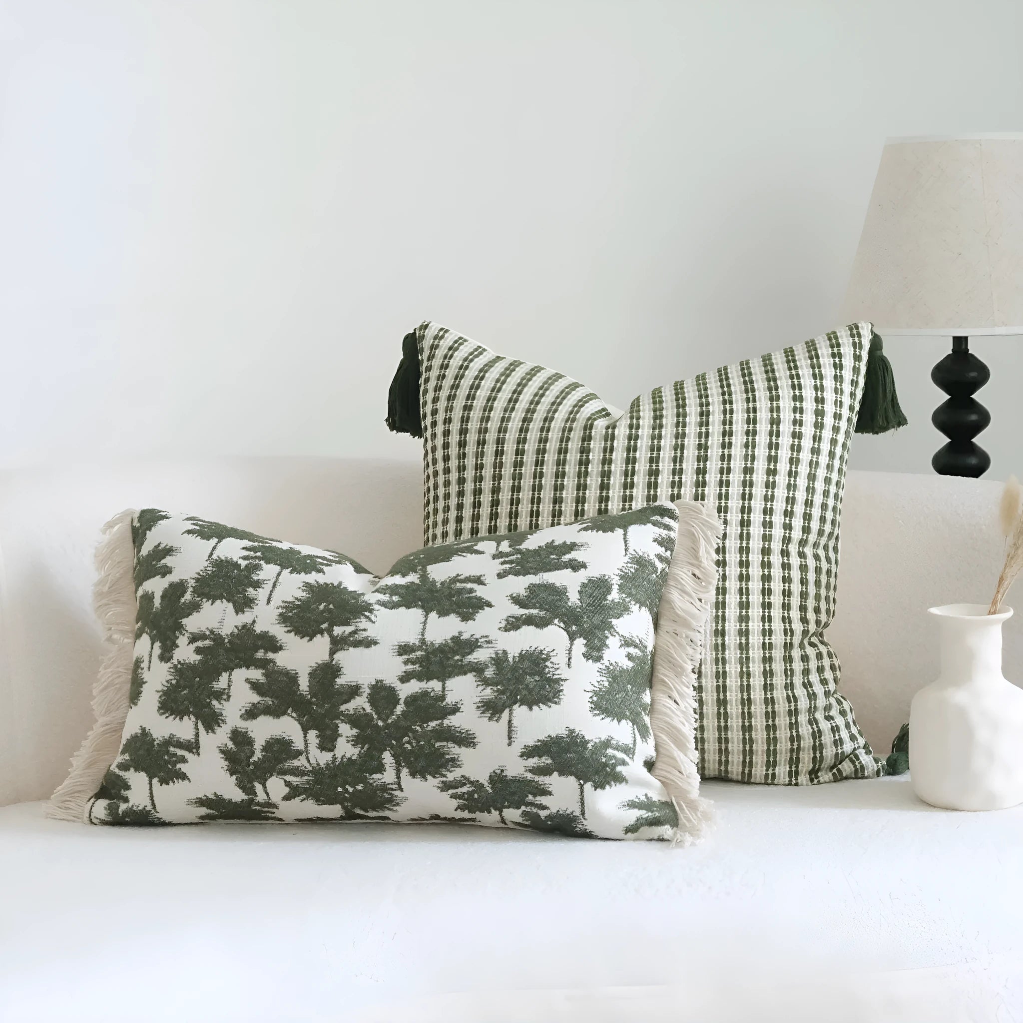 Green cotton and linen tassel hotel sample pillow with botanical pattern on brushed fabric pillowcase