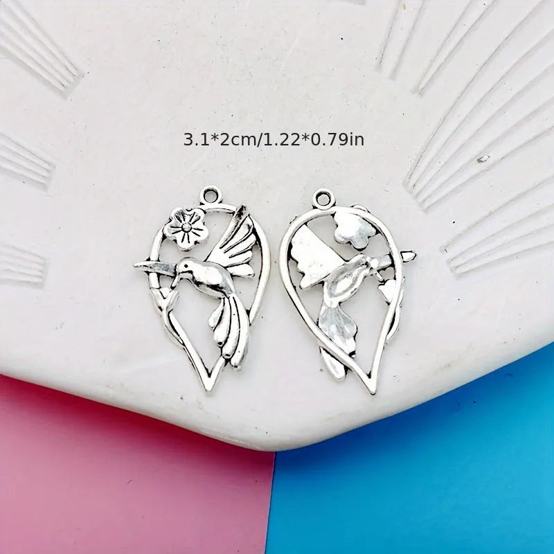 Alloy magpie bird pendant with electroplated finish in colour P234 for DIY jewellery making