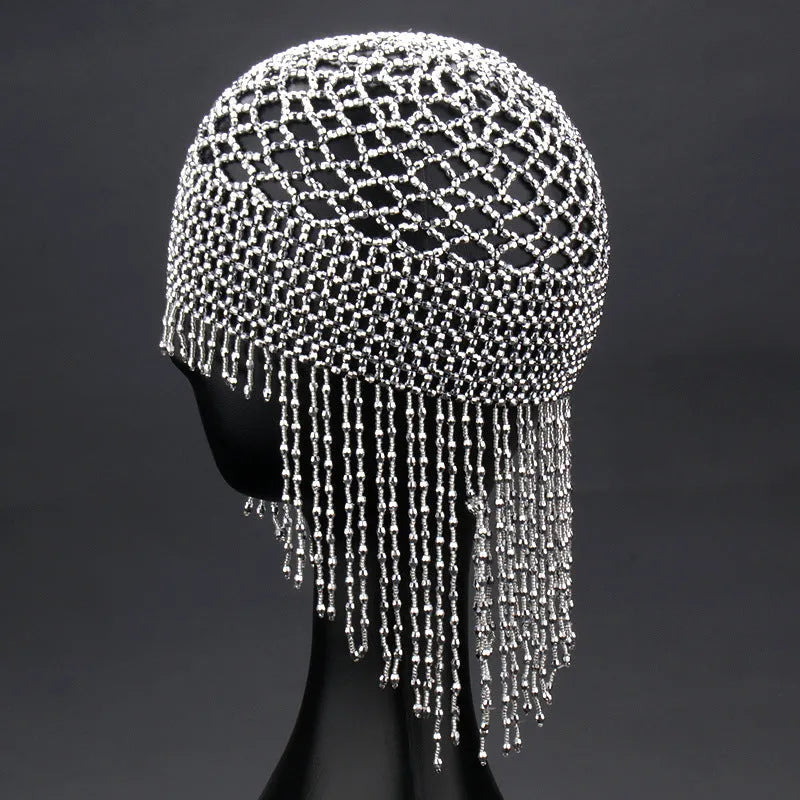 Belly dance headwear with alloy base, handmade beading, and 16.5cm tassels in silver or black mesh decoration