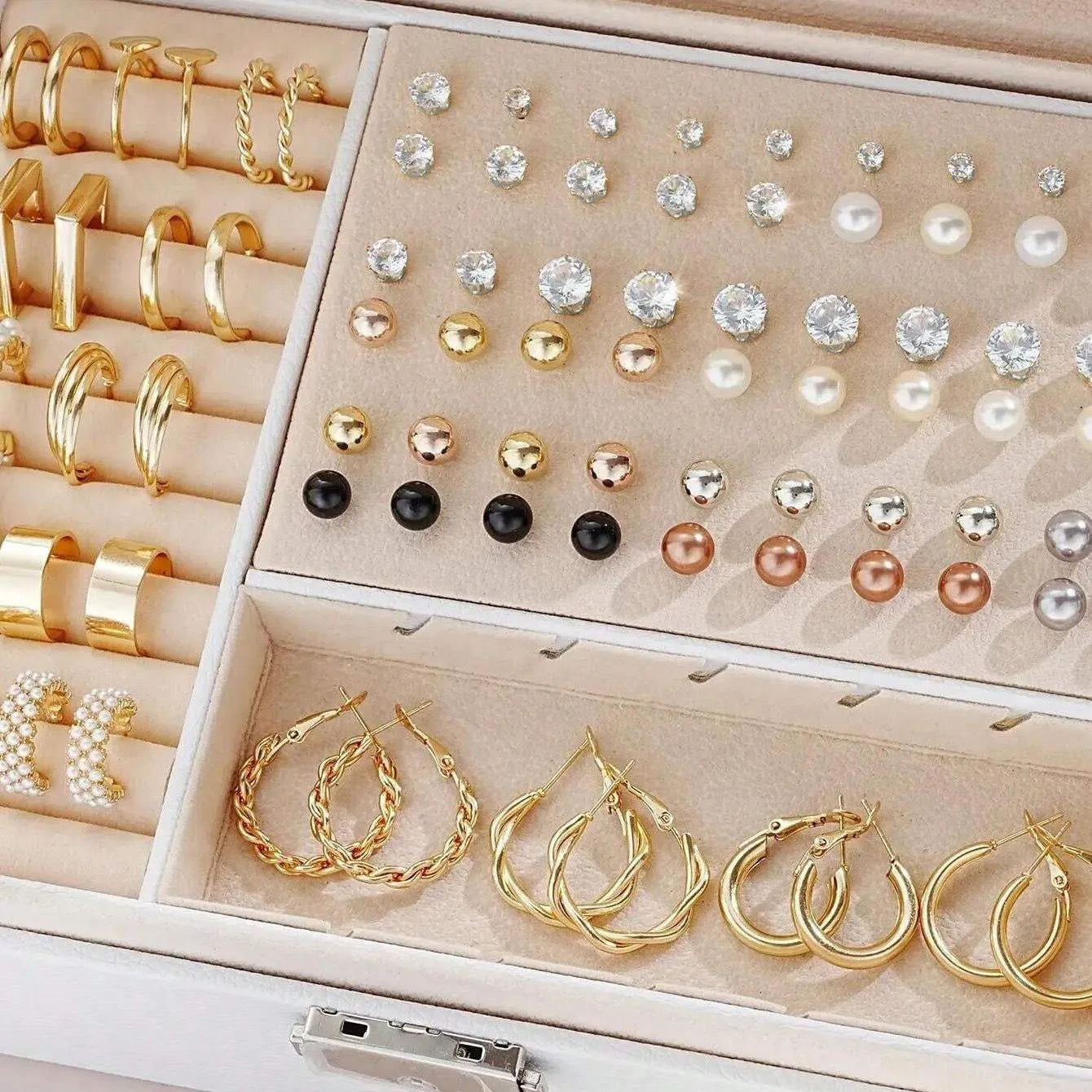 108 geometric pearl earrings with gold electroplated alloy construction and round elements